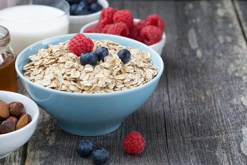 fresh breakfast products on a dark wooden background, close-up