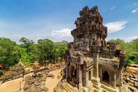 View of prang and rainforest from top of Ta Keo temple in Angkor