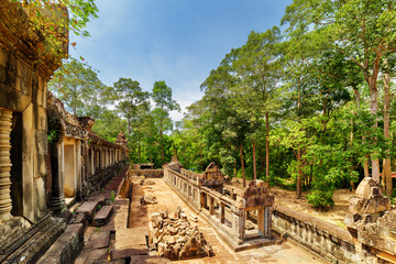 View of galleries and ruins of ancient Ta Keo temple in Angkor