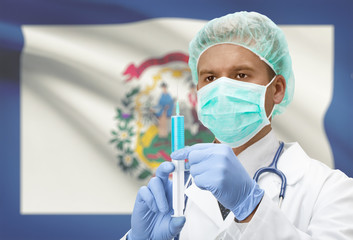 Fototapeta premium Doctor with syringe in hands and US states flags on background series - West Virginia