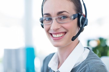 Close up view of happy businesswoman with headset 