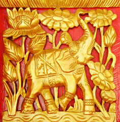 Thai style wooden craft on wall,Thai temple.