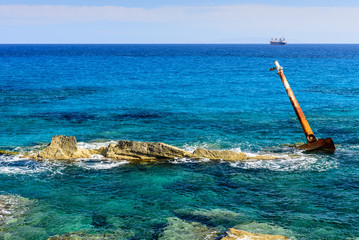 The skeleton of a sunken ship off the coast of Milos, Sarakiniko, Cyclades, Greece.