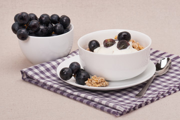 Muesli With Yogurt Breakfast. Black Grapes