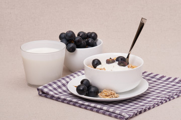 Muesli With Yogurt Breakfast. Black Grapes