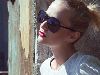 Eyewear concept. Portrait of fashionable young woman with stylis