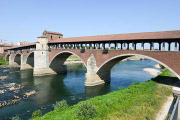 Fototapeta na wymiar Pavia, Italy: Covered bridge over the river Ticino.
