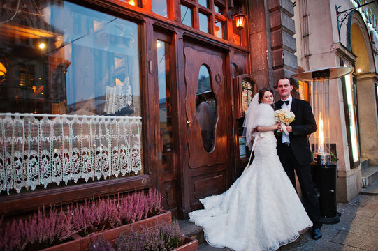 Happy wedding couple in evening Krakow