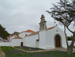 The white small Hermitage of San Pedro Alcantara in the village La Ampuyenta on the island Fuerteventura. The island is one of the Canary islands belonging to Spain