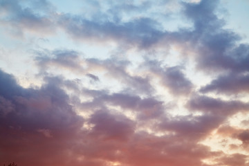 Naklejka na ściany i meble Cloudy evening sky