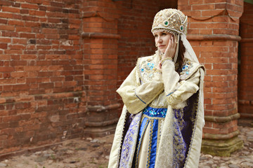 Young beautiful woman in Russian costume