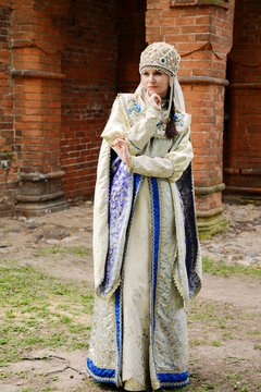 Young beautiful woman in Russian costume