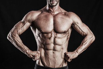 muscle man torso on black background, bodybuilding athlete portr