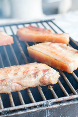 barbecue grill pork on fire