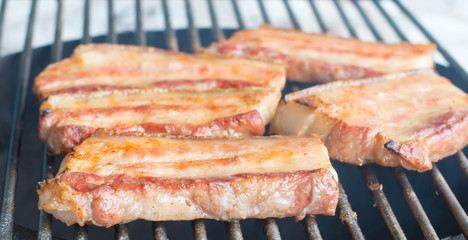barbecue grill pork on fire