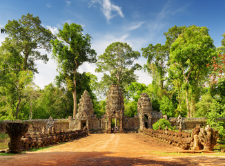 Stone Asuras on bridge leading to Preah Khan temple in Angkor