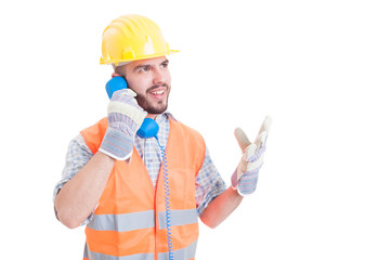 Construction worker or engineer talking on the phone