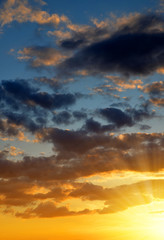 Colorful sky with clouds at sunset. Nature background. 
