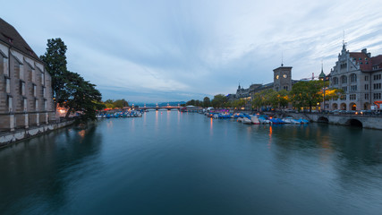 Obraz premium Zurich cityscape with Limmat river and old town city center on evening or night