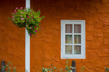 Window With Flower Basket On Wall