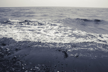 landscape by the sea, choppy water, monochrome toned