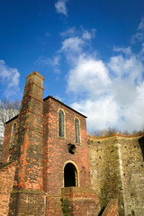English industrial building. An old English Victorian blast furnace in Coalbrookdale, Shropshire, with an entrance and windows resembling a human face.