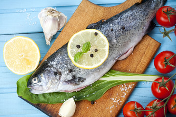 River trout with fresh tomatoes, lemon and herbs