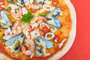 delicious hot seafood pizza from oven