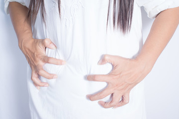Asian women with abdominal pain.