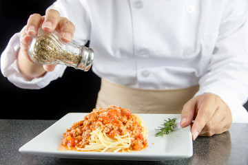 chef pouring peper