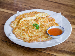 Omelette with chilli sauce