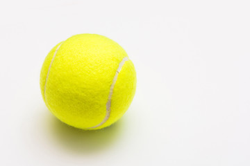 green tennis ball on white background