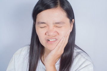 Fototapeta premium Asian women toothache.
