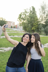 Mother and daughter makes a selfie