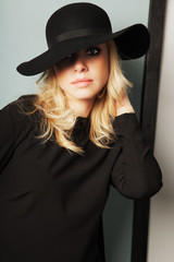 Fototapeta premium Retro portrait of a beautiful young woman