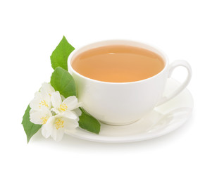 Obraz na płótnie Canvas Cup of green tea with jasmine flowers isolated on white backgrou