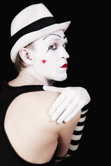 grimace mime in white hat isolated on black background