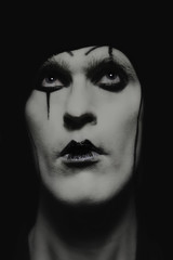 theatrical actor with dark makeup