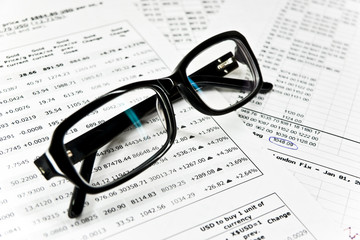 Glasses and financial documents