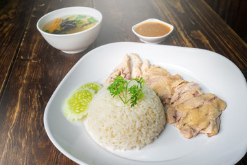 hainanese boiled chicken rice on the wooden table