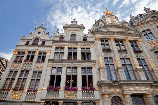 Historical Buildings of Grand Place in Brussels Against Cloudy Blue Sky