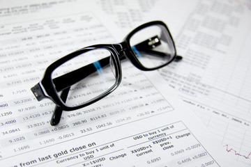 Glasses and financial documents