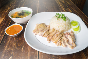 hainanese boiled chicken rice on the wooden table