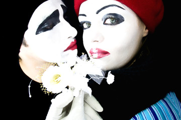 mimes with a flower