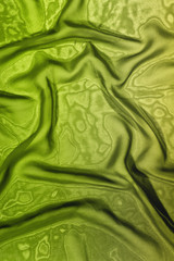 Texture of green satin silk