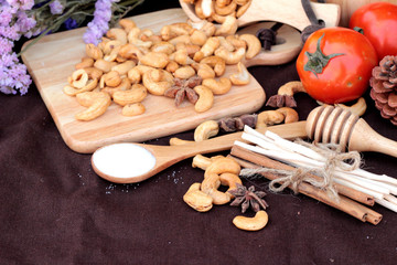 Fototapeta na wymiar Roasted cashews nuts with natura