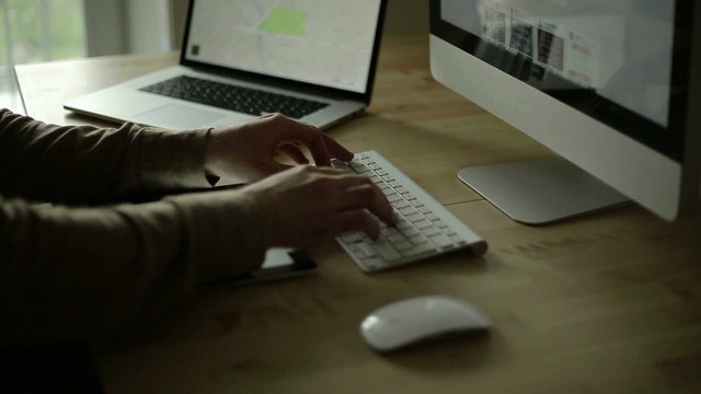 Working On A New Design part3
Wireframing and web design happening on a computer in the distance while designer focuses on ios tablet.
