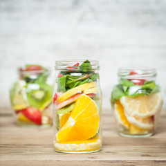Fresh cutted fruit in jar