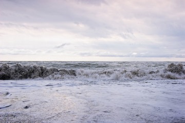 Ocean waves on a sandy beach