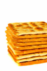 Crackers.
Stacked cream crackers isolated on a white background.
